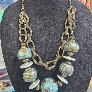 Gold and Blue Artisanal Necklace with Layered Design